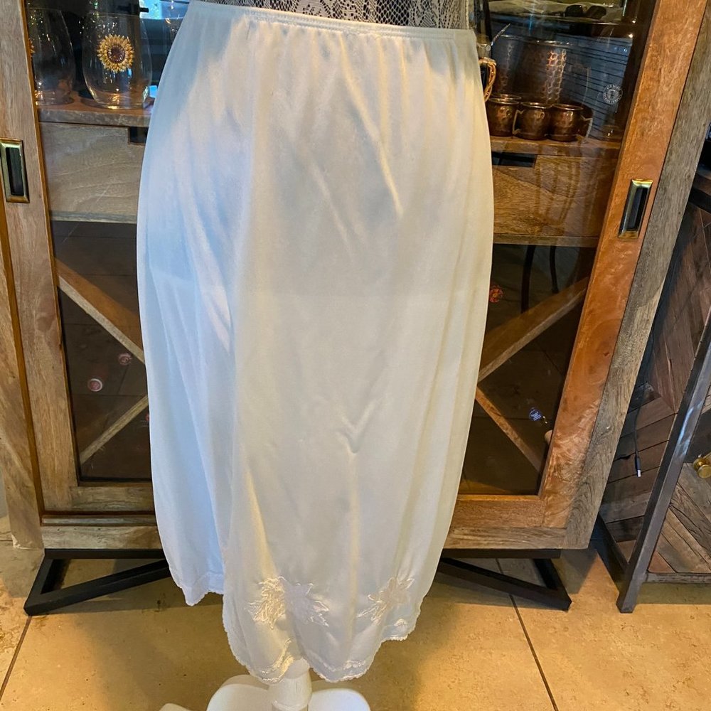 Vintage light blue half Slip no tag left great flower decals some wear